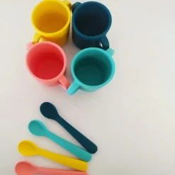 Juego de 2 vasos para bebés de silicona, coral y amarillo - Ekobo