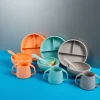 Plato con compartimentos y ventosa para bebé de silicona platino, color naranja - Lurch